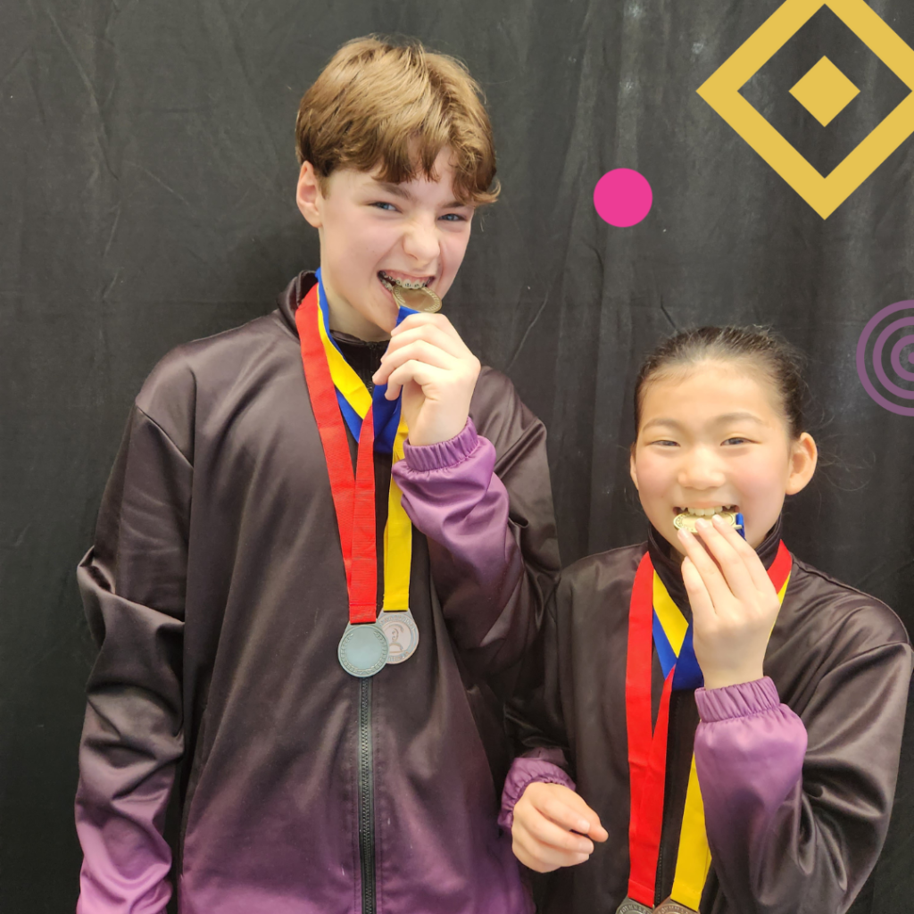 Acro athletes celebrate competition with medals