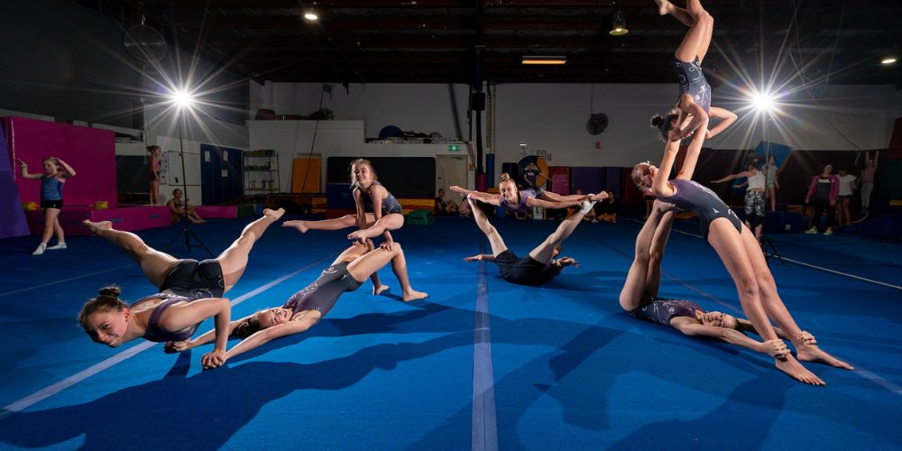 Gymnasts doing routines in the floor - Skylark Sports