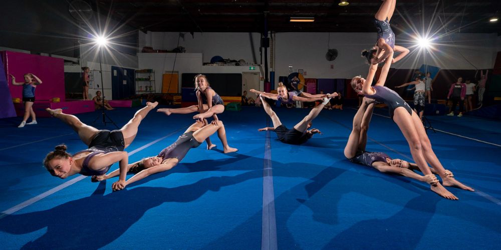 Gymnasts doing floor routines - Skylark Sports