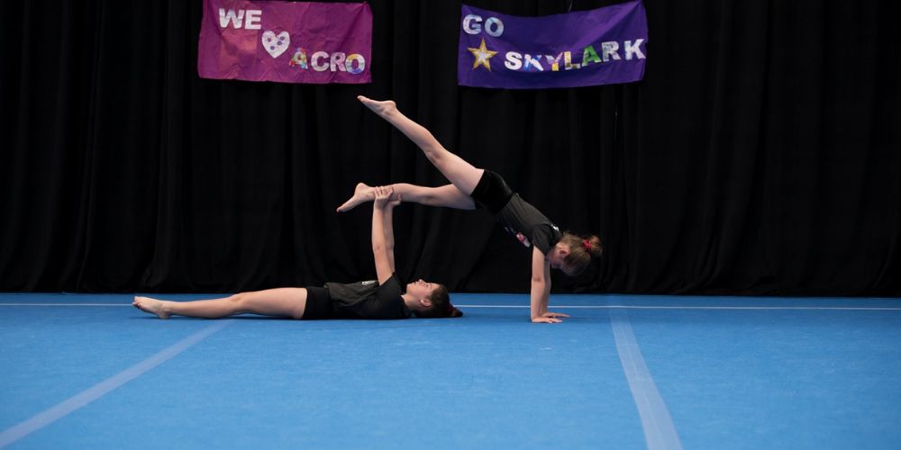 Acrobatics on gymnastics floor - Skylark Sports