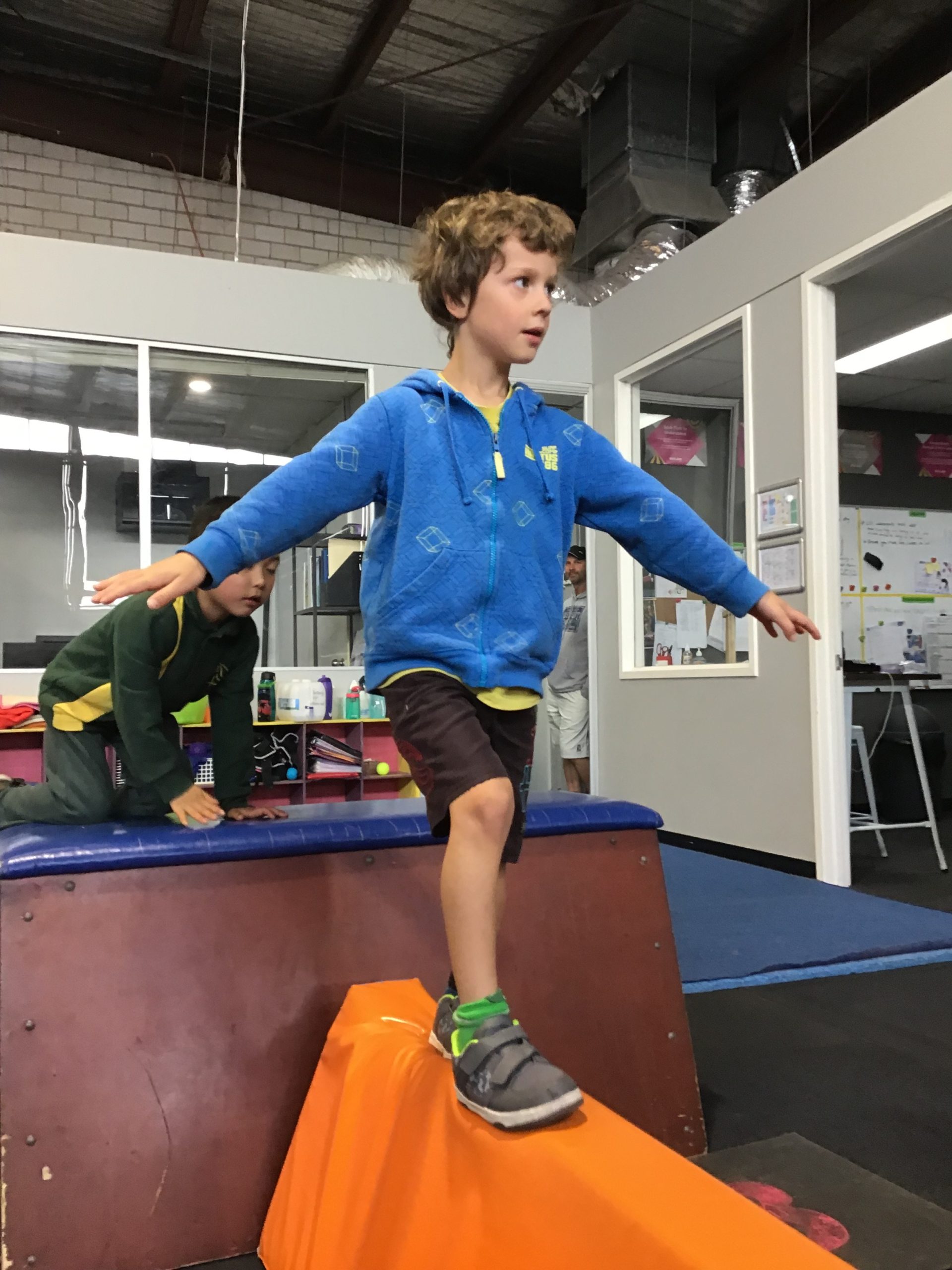 ninja focuses and balance walking along raised beam